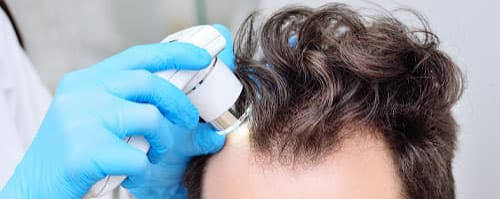 Avaliação clínica com dermatoscópio